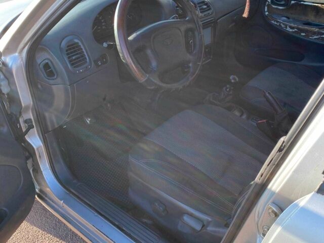 Сірий Деу Нубіра, об'ємом двигуна 1.6 л та пробігом 200 тис. км за 1300 $, фото 5 на Automoto.ua