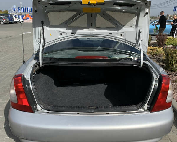 Сірий Деу Нубіра, об'ємом двигуна 1.6 л та пробігом 161 тис. км за 1799 $, фото 22 на Automoto.ua