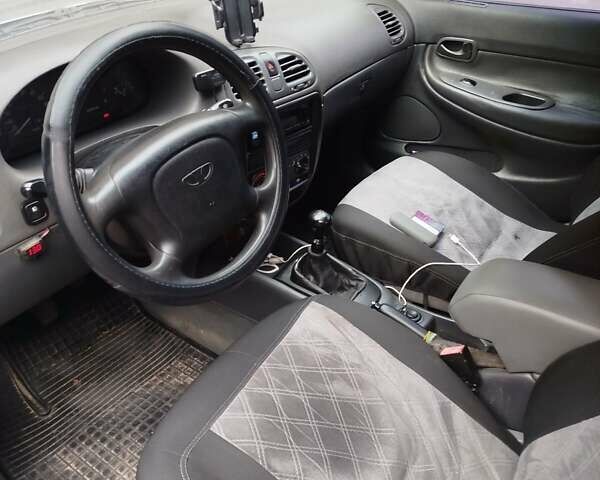 Сірий Деу Нубіра, об'ємом двигуна 1.6 л та пробігом 262 тис. км за 1750 $, фото 4 на Automoto.ua