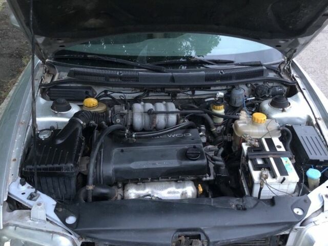 Сірий Деу Нубіра, об'ємом двигуна 1.6 л та пробігом 305 тис. км за 1250 $, фото 7 на Automoto.ua