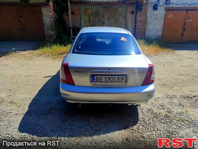 Серый Дэу Нубира, объемом двигателя 1.6 л и пробегом 270 тыс. км за 2200 $, фото 2 на Automoto.ua