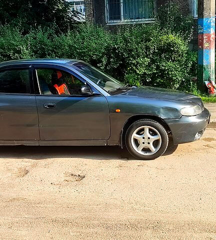 Сірий Деу Нубіра, об'ємом двигуна 1.6 л та пробігом 220 тис. км за 1700 $, фото 4 на Automoto.ua