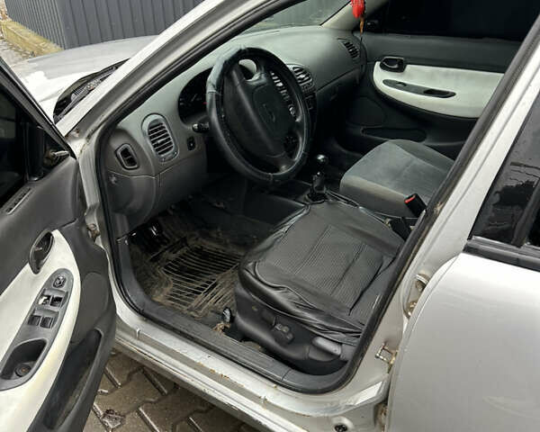 Серый Дэу Нубира, объемом двигателя 1.6 л и пробегом 255 тыс. км за 713 $, фото 5 на Automoto.ua