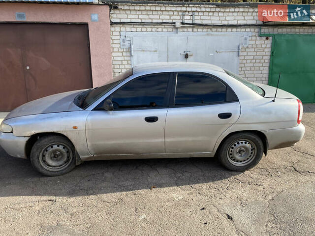 Сірий Деу Нубіра, об'ємом двигуна 1.6 л та пробігом 255 тис. км за 715 $, фото 7 на Automoto.ua