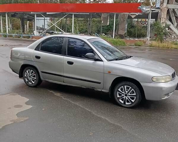 Сірий Деу Нубіра, об'ємом двигуна 8 л та пробігом 349 тис. км за 1400 $, фото 2 на Automoto.ua