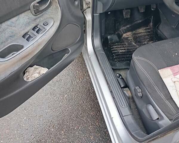 Сірий Деу Нубіра, об'ємом двигуна 8 л та пробігом 349 тис. км за 1400 $, фото 5 на Automoto.ua