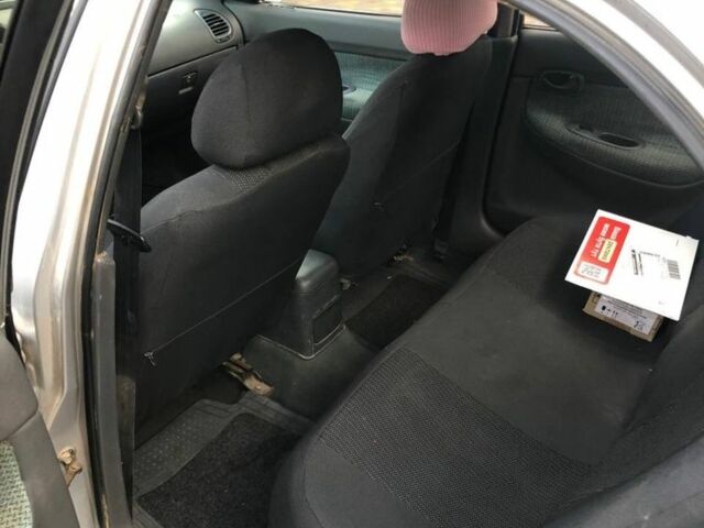 Сірий Деу Нубіра, об'ємом двигуна 1.6 л та пробігом 305 тис. км за 1250 $, фото 6 на Automoto.ua