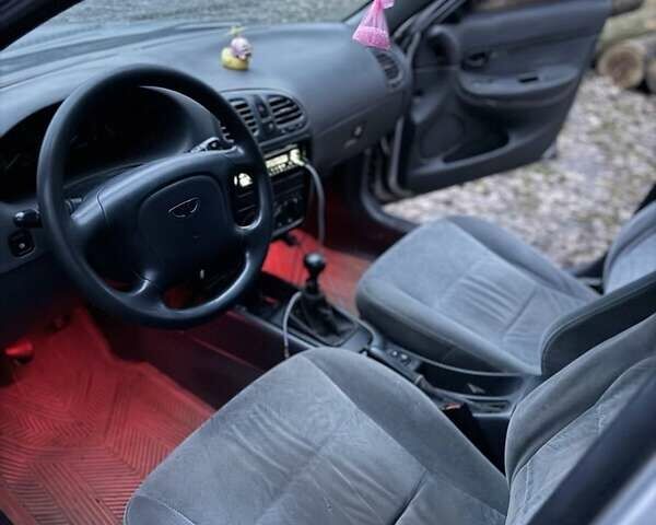 Серый Дэу Нубира, объемом двигателя 1.6 л и пробегом 235 тыс. км за 1900 $, фото 3 на Automoto.ua