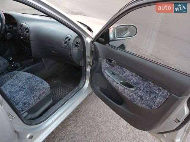 Серый Дэу Нубира, объемом двигателя 1.6 л и пробегом 200 тыс. км за 2600 $, фото 49 на Automoto.ua