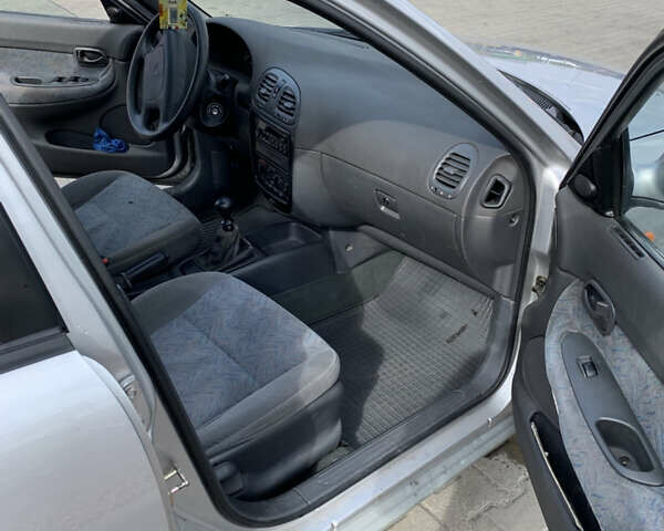 Сірий Деу Нубіра, об'ємом двигуна 1.6 л та пробігом 161 тис. км за 1799 $, фото 10 на Automoto.ua