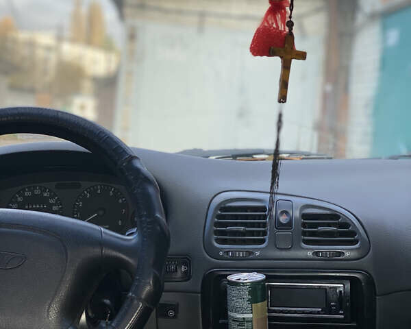 Сірий Деу Нубіра, об'ємом двигуна 1.6 л та пробігом 255 тис. км за 715 $, фото 4 на Automoto.ua