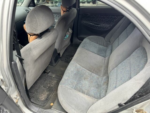 Сірий Деу Нубіра, об'ємом двигуна 1.6 л та пробігом 395 тис. км за 2000 $, фото 5 на Automoto.ua