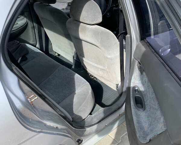 Сірий Деу Нубіра, об'ємом двигуна 1.6 л та пробігом 161 тис. км за 1799 $, фото 9 на Automoto.ua