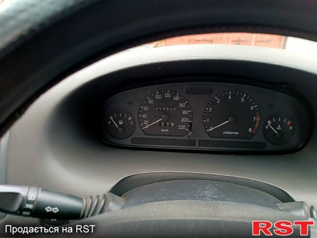 Серый Дэу Нубира, объемом двигателя 1.6 л и пробегом 350 тыс. км за 1100 $, фото 5 на Automoto.ua