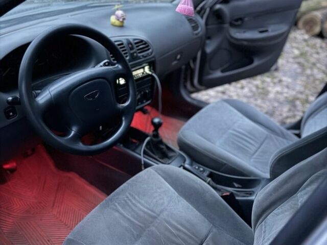 Сірий Деу Нубіра, об'ємом двигуна 1.6 л та пробігом 235 тис. км за 1900 $, фото 4 на Automoto.ua