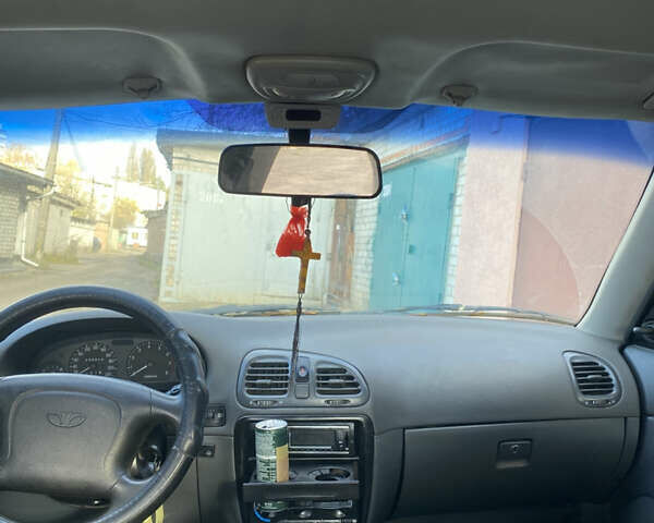 Сірий Деу Нубіра, об'ємом двигуна 1.6 л та пробігом 255 тис. км за 715 $, фото 5 на Automoto.ua