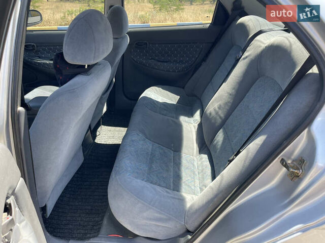 Серый Дэу Нубира, объемом двигателя 1.6 л и пробегом 280 тыс. км за 1799 $, фото 8 на Automoto.ua