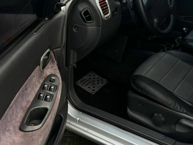 Сірий Деу Нубіра, об'ємом двигуна 1.6 л та пробігом 280 тис. км за 1800 $, фото 10 на Automoto.ua