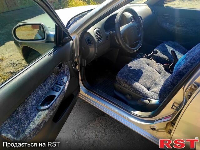 Серый Дэу Нубира, объемом двигателя 1.6 л и пробегом 270 тыс. км за 2200 $, фото 3 на Automoto.ua