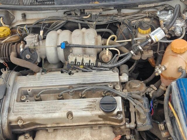 Сірий Деу Нубіра, об'ємом двигуна 1.6 л та пробігом 300 тис. км за 1350 $, фото 6 на Automoto.ua