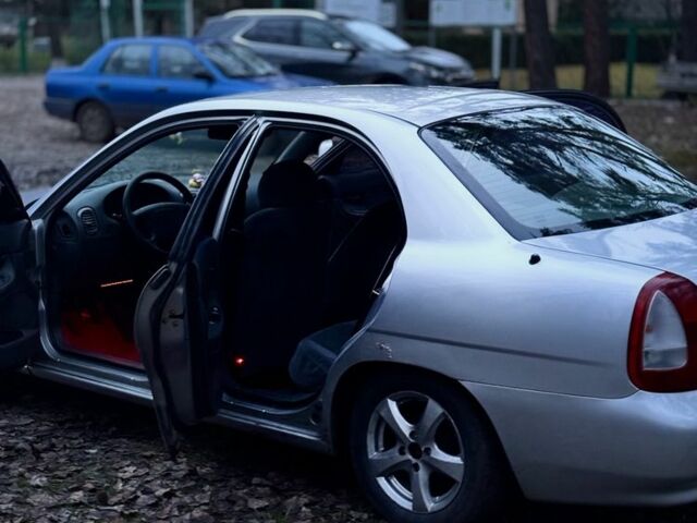 Сірий Деу Нубіра, об'ємом двигуна 1.6 л та пробігом 235 тис. км за 1900 $, фото 9 на Automoto.ua