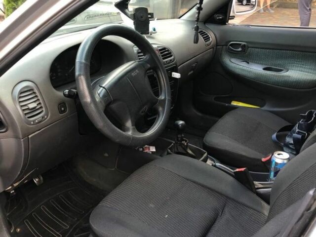 Сірий Деу Нубіра, об'ємом двигуна 1.6 л та пробігом 305 тис. км за 1250 $, фото 5 на Automoto.ua