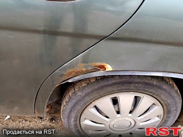 Серый Дэу Нубира, объемом двигателя 1.6 л и пробегом 350 тыс. км за 1100 $, фото 4 на Automoto.ua