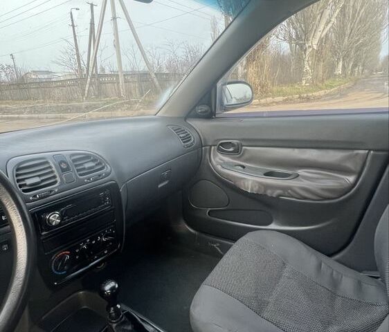 Серый Дэу Нубира, объемом двигателя 1.6 л и пробегом 298 тыс. км за 1500 $, фото 6 на Automoto.ua