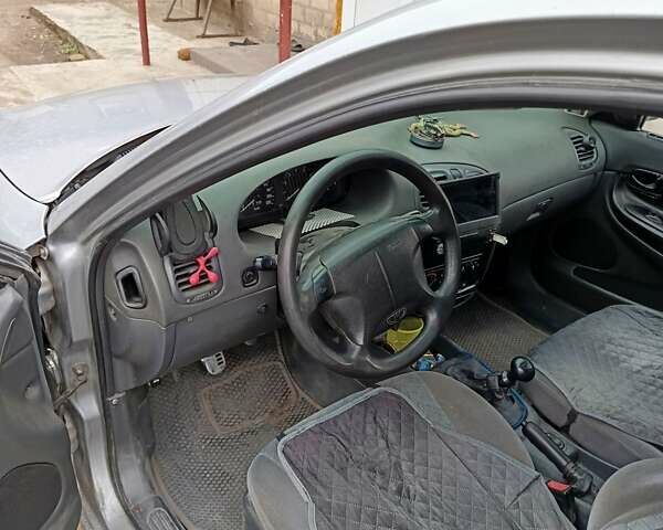 Сірий Деу Нубіра, об'ємом двигуна 1.6 л та пробігом 400 тис. км за 2300 $, фото 3 на Automoto.ua