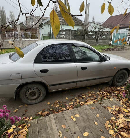 Серый Дэу Нубира, объемом двигателя 1.6 л и пробегом 298 тыс. км за 1800 $, фото 2 на Automoto.ua