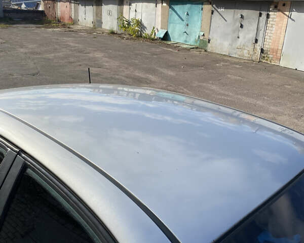 Сірий Деу Нубіра, об'ємом двигуна 1.6 л та пробігом 255 тис. км за 715 $, фото 9 на Automoto.ua