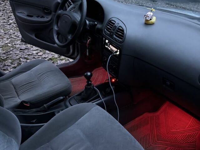 Сірий Деу Нубіра, об'ємом двигуна 1.6 л та пробігом 235 тис. км за 1900 $, фото 5 на Automoto.ua