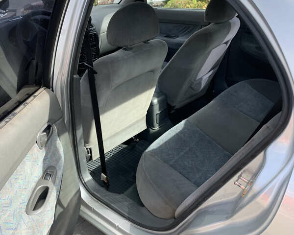 Сірий Деу Нубіра, об'ємом двигуна 1.6 л та пробігом 161 тис. км за 1799 $, фото 8 на Automoto.ua