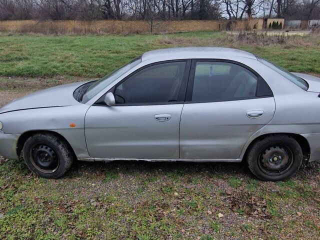 Сірий Деу Нубіра, об'ємом двигуна 1.6 л та пробігом 300 тис. км за 1350 $, фото 5 на Automoto.ua