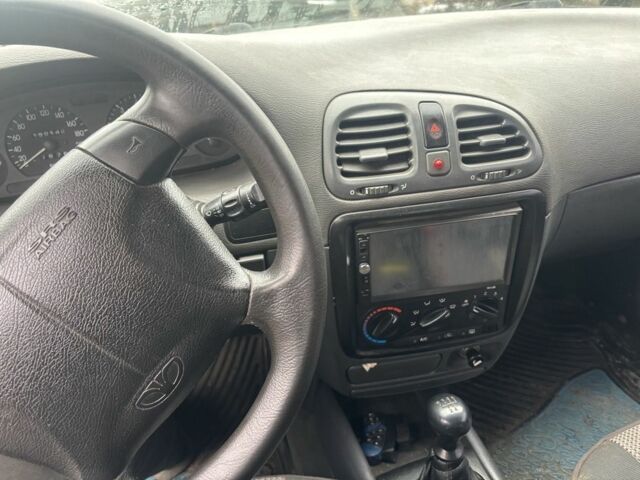 Серый Дэу Нубира, объемом двигателя 1.6 л и пробегом 200 тыс. км за 616 $, фото 5 на Automoto.ua