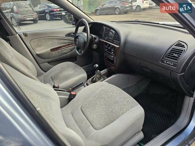 Серый Дэу Нубира, объемом двигателя 2 л и пробегом 247 тыс. км за 1700 $, фото 9 на Automoto.ua