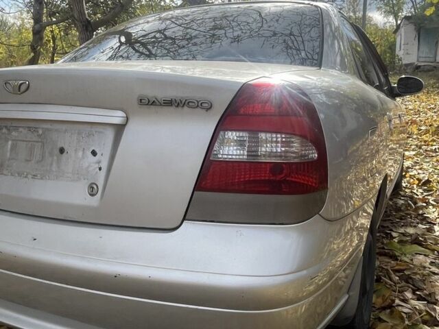 Сірий Деу Нубіра, об'ємом двигуна 2 л та пробігом 240 тис. км за 1200 $, фото 6 на Automoto.ua