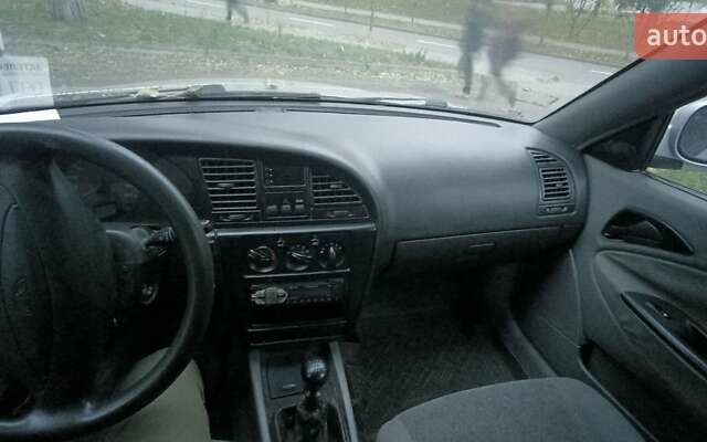 Сірий Деу Нубіра, об'ємом двигуна 1.6 л та пробігом 379 тис. км за 1700 $, фото 10 на Automoto.ua