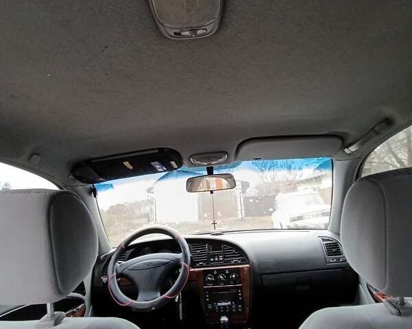 Сірий Деу Нубіра, об'ємом двигуна 2.02 л та пробігом 300 тис. км за 2500 $, фото 13 на Automoto.ua