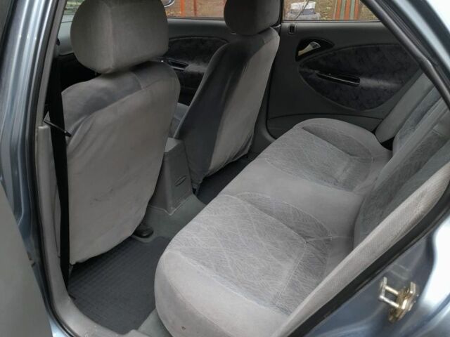 Сірий Деу Нубіра, об'ємом двигуна 1.6 л та пробігом 198 тис. км за 2000 $, фото 5 на Automoto.ua