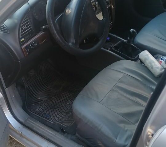 Серый Дэу Нубира, объемом двигателя 2 л и пробегом 290 тыс. км за 900 $, фото 10 на Automoto.ua