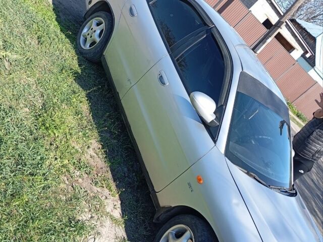 Серый Дэу Нубира, объемом двигателя 1.6 л и пробегом 295 тыс. км за 1700 $, фото 2 на Automoto.ua