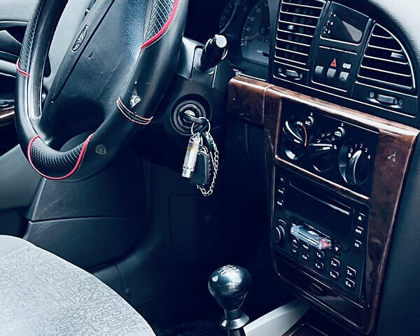 Серый Дэу Нубира, объемом двигателя 2 л и пробегом 280 тыс. км за 2200 $, фото 15 на Automoto.ua