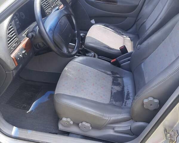 Серый Дэу Нубира, объемом двигателя 2 л и пробегом 171 тыс. км за 3200 $, фото 6 на Automoto.ua