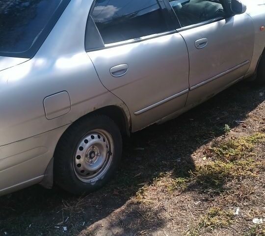 Серый Дэу Нубира, объемом двигателя 2 л и пробегом 290 тыс. км за 900 $, фото 11 на Automoto.ua