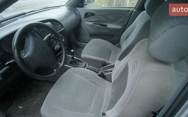 Сірий Деу Нубіра, об'ємом двигуна 1.6 л та пробігом 379 тис. км за 1700 $, фото 9 на Automoto.ua