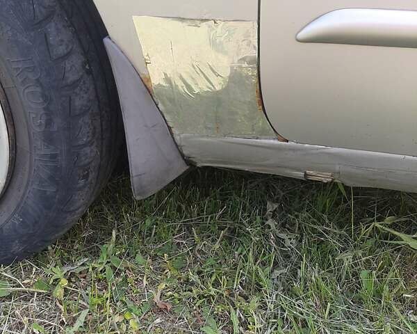 Серый Дэу Нубира, объемом двигателя 2 л и пробегом 171 тыс. км за 3200 $, фото 7 на Automoto.ua