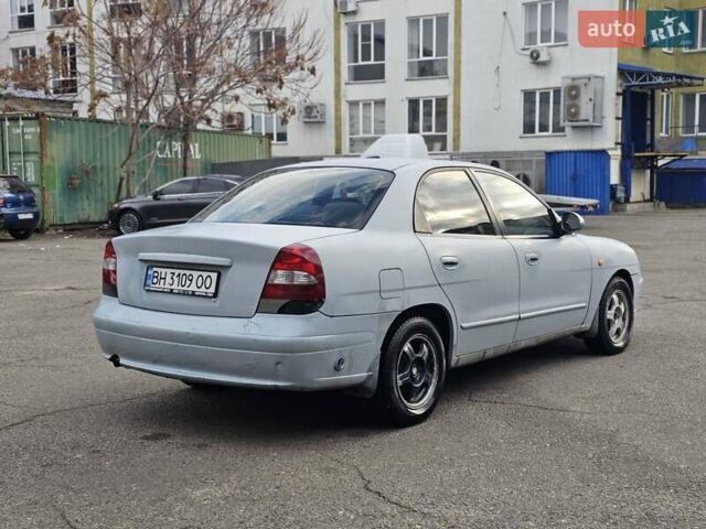 Серый Дэу Нубира, объемом двигателя 2 л и пробегом 247 тыс. км за 1700 $, фото 4 на Automoto.ua