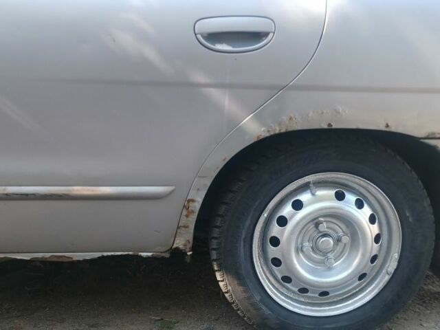 Серый Дэу Нубира, объемом двигателя 2 л и пробегом 290 тыс. км за 900 $, фото 9 на Automoto.ua