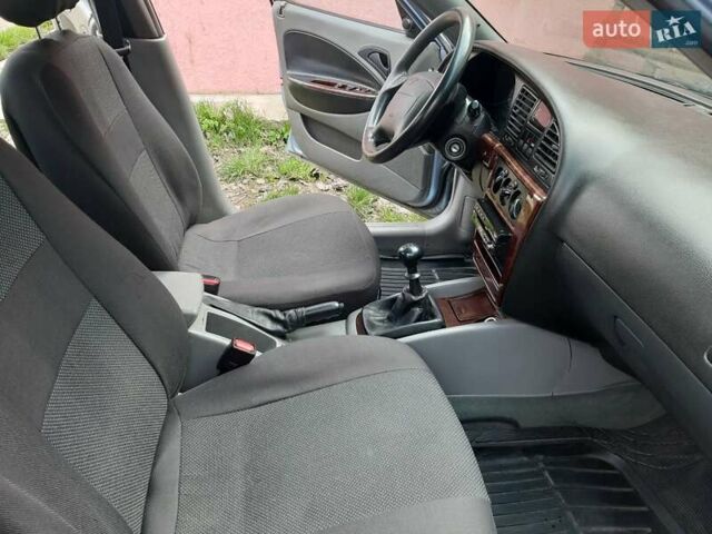 Сірий Деу Нубіра, об'ємом двигуна 2 л та пробігом 153 тис. км за 3300 $, фото 12 на Automoto.ua